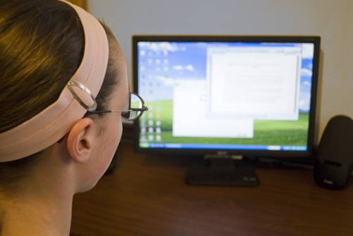 girl using computer